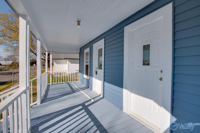 wooden deck featuring a porch
