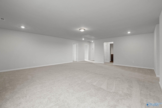 empty room with light colored carpet