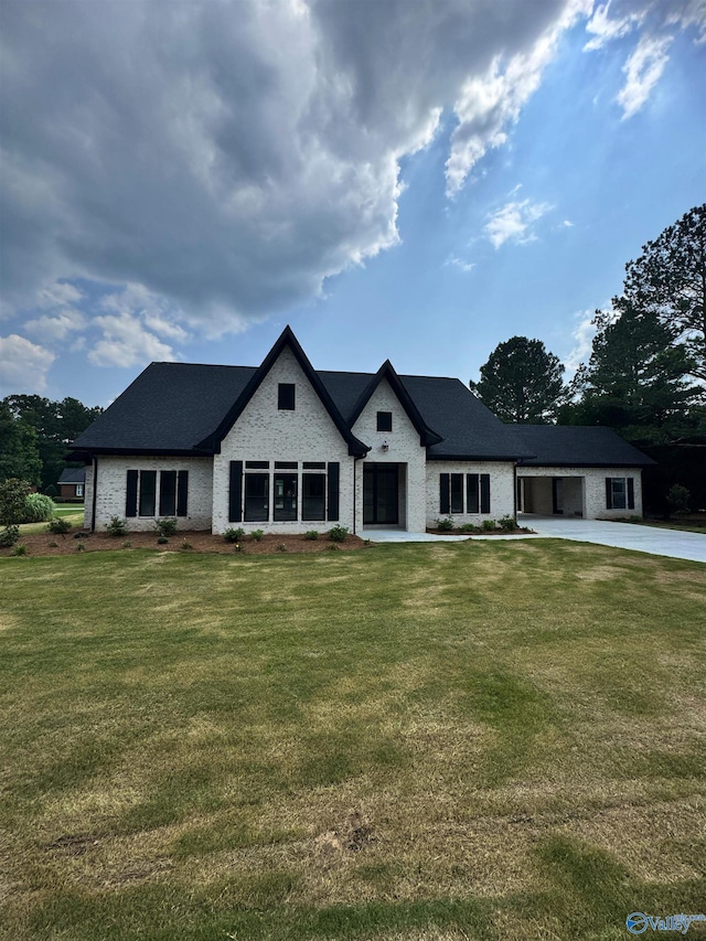 4829 Whorton Bend Rd, Gadsden, AL 35901 - view of front of house with a front lawn, brick siding, and concrete driveway