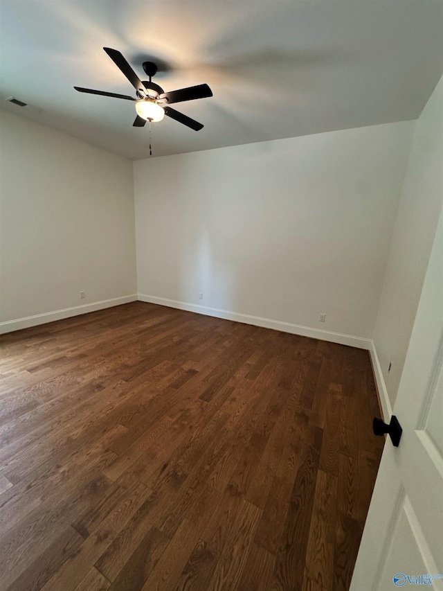 4829 Whorton Bend Rd, Gadsden, AL 35901 - unfurnished room featuring dark wood-style flooring and a ceiling fan