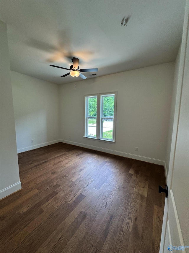 4829 Whorton Bend Rd, Gadsden, AL 35901 - spare room featuring dark wood finished floors and a ceiling fan