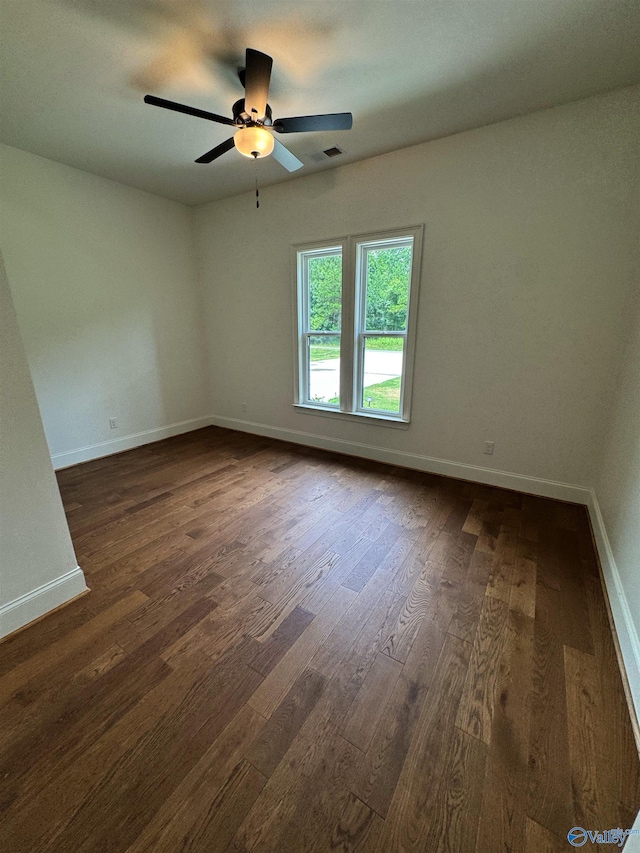 4829 Whorton Bend Rd, Gadsden, AL 35901 - unfurnished room featuring dark wood-type flooring and a ceiling fan