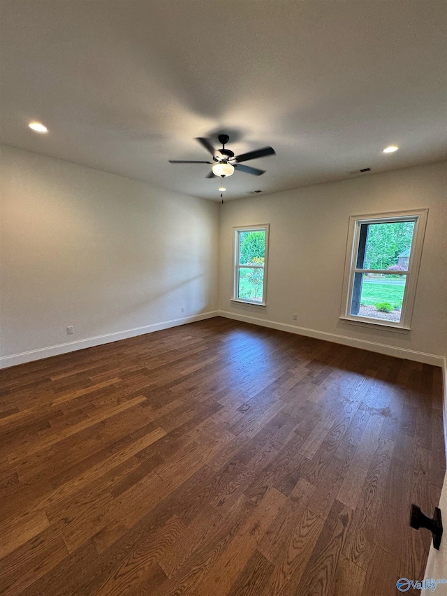 4829 Whorton Bend Rd, Gadsden, AL 35901 - empty room with dark wood finished floors, a ceiling fan, and recessed lighting