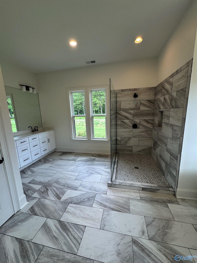 4829 Whorton Bend Rd, Gadsden, AL 35901 - bathroom with vanity, a tile shower, recessed lighting, and marble finish flooring