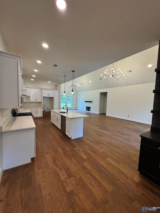 4829 Whorton Bend Rd, Gadsden, AL 35901 - kitchen featuring open floor plan, a fireplace, light countertops, dark wood-type flooring, and recessed lighting