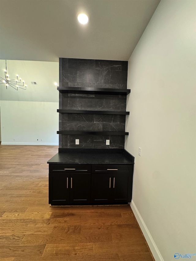 4829 Whorton Bend Rd, Gadsden, AL 35901 - detailed view of a chandelier and wood finished floors