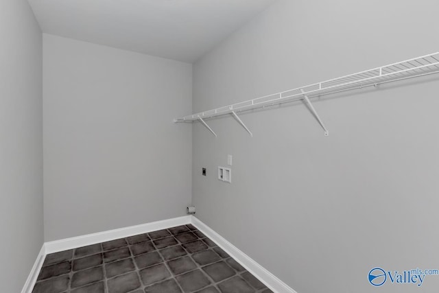 washroom featuring electric dryer hookup, baseboards, laundry area, and washer hookup