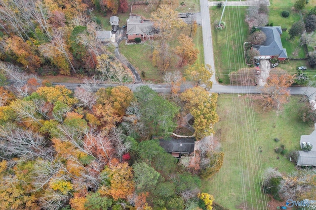 birds eye view of property with a rural view