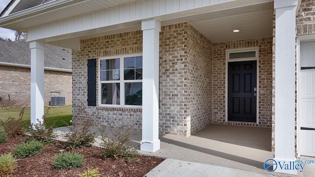 doorway to property featuring covered porch