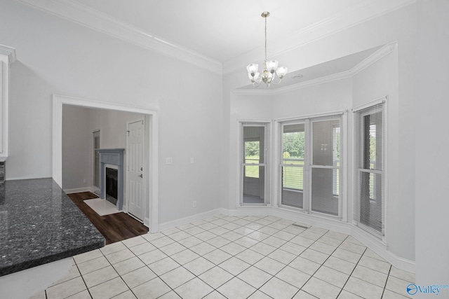 10214 New Cut Rd, Athens, AL 35611 - unfurnished living room featuring light tile patterned flooring, ornamental molding, a chandelier, and a fireplace with flush hearth