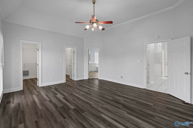 10214 New Cut Rd, Athens, AL 35611 - unfurnished bedroom featuring a walk in closet, wood finished floors, ensuite bath, ornamental molding, and a closet