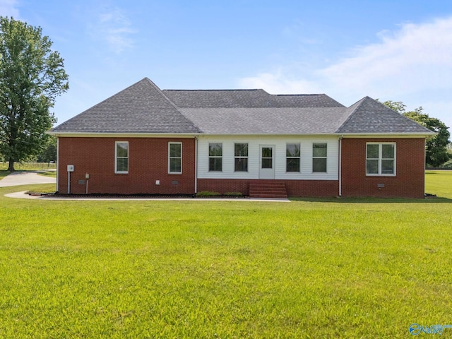 10214 New Cut Rd, Athens, AL 35611 - rear view of house with brick siding, a yard, and a shingled roof