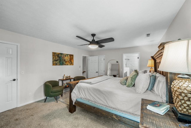 carpeted bedroom with ceiling fan and connected bathroom