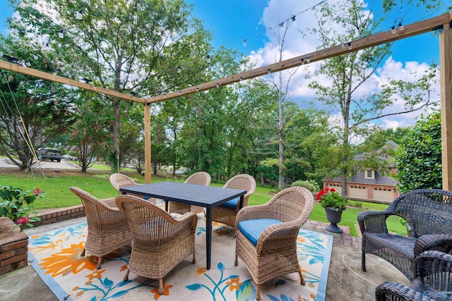 view of patio / terrace featuring an outdoor living space and a garage