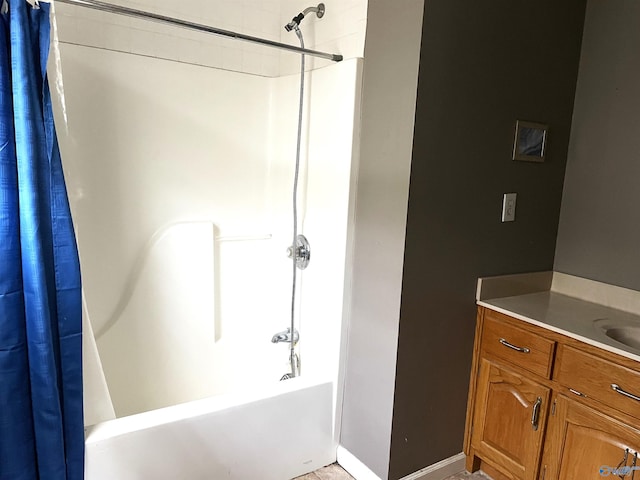 bathroom featuring vanity and shower / tub combo