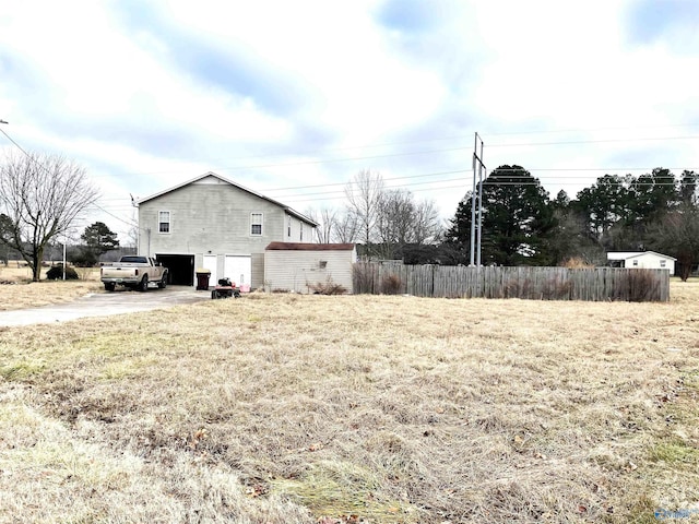 view of yard featuring a garage