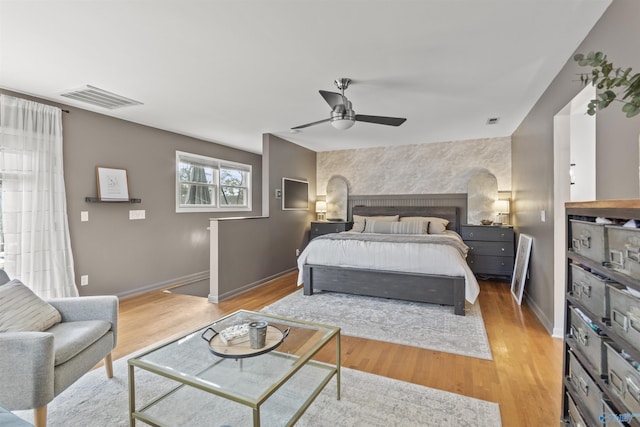 bedroom featuring ceiling fan and light wood-type flooring