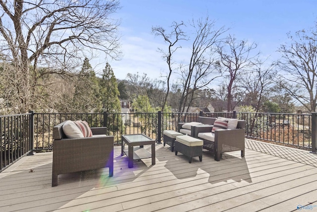 wooden terrace featuring an outdoor hangout area