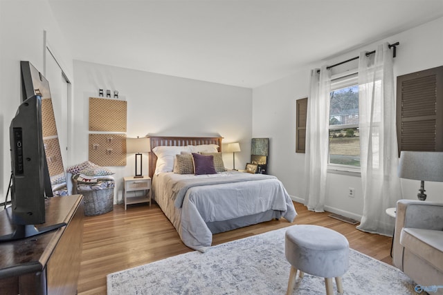 bedroom featuring light wood-type flooring