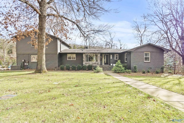 view of front of house with a front lawn