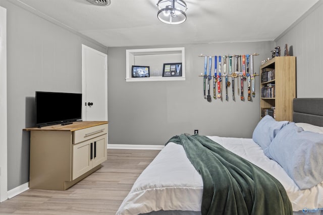 bedroom featuring light wood-type flooring