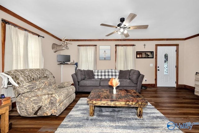 215 Dusty Dr SW, Arab, AL 35016 - living room featuring a ceiling fan, wood finished floors, ornamental molding, and plenty of natural light