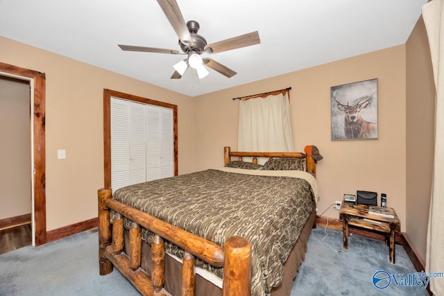 215 Dusty Dr SW, Arab, AL 35016 - carpeted bedroom featuring a closet and ceiling fan