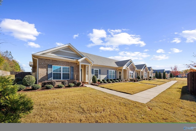 view of front of home featuring a front yard