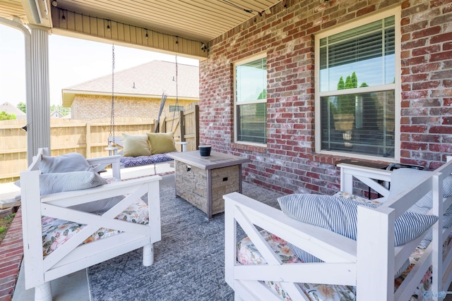 view of patio / terrace with fence and an outdoor hangout area