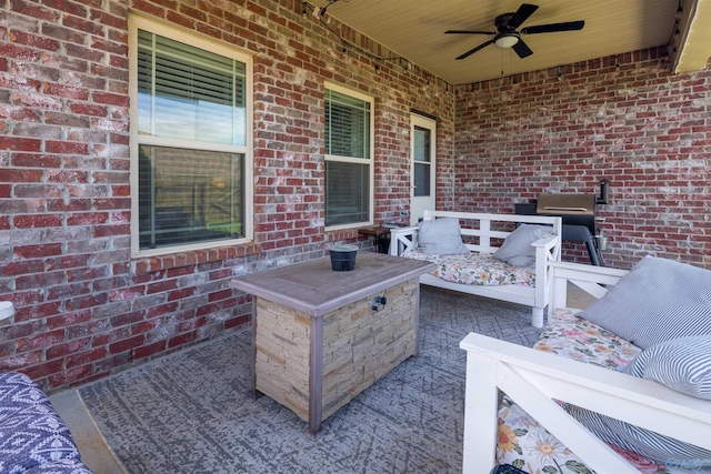 view of patio featuring a ceiling fan