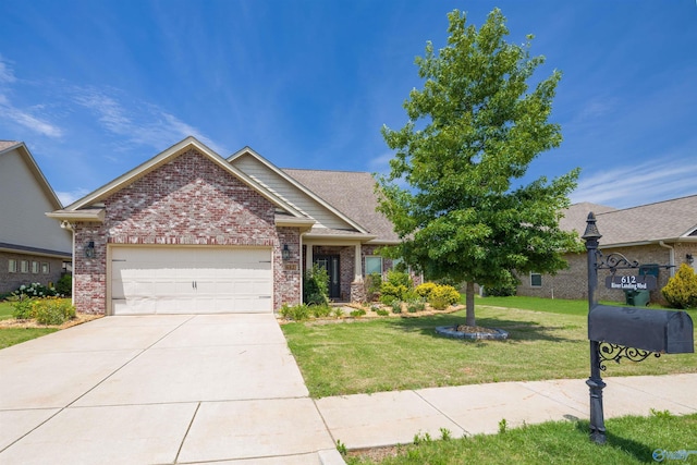 view of front of house with a garage, driveway, a front lawn, and brick siding