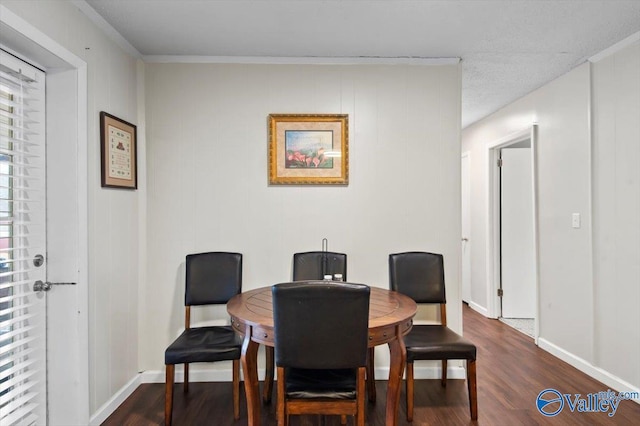 dining room with dark wood-type flooring