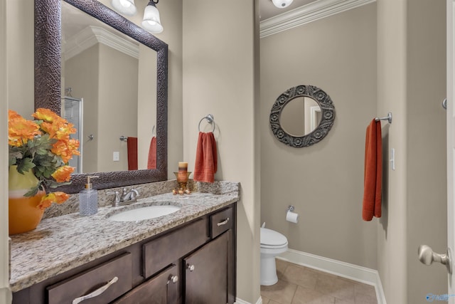 bathroom with tile patterned flooring, vanity, toilet, and ornamental molding