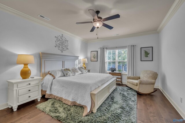 bedroom featuring ceiling fan, crown molding, and dark hardwood / wood-style flooring