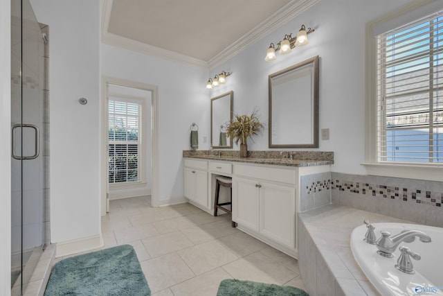 bathroom with vanity, a wealth of natural light, tile patterned floors, and crown molding