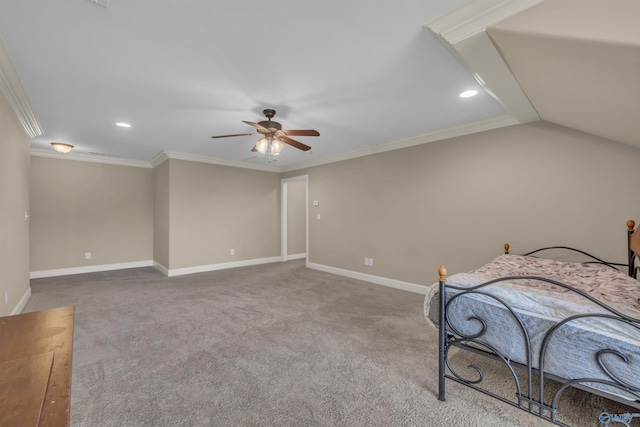 carpeted bedroom featuring vaulted ceiling, ceiling fan, and crown molding