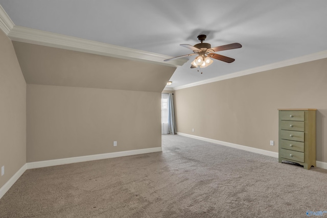 additional living space featuring lofted ceiling, carpet, and ceiling fan