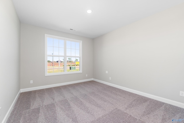 view of carpeted spare room