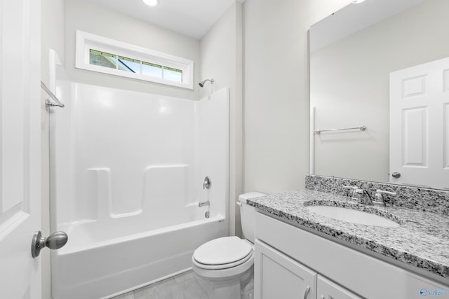 full bathroom featuring vanity, shower / washtub combination, toilet, and tile patterned floors