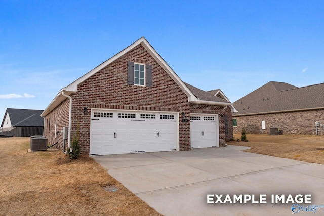 view of property exterior featuring a garage and central air condition unit