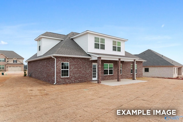 rear view of house featuring a patio