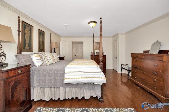 bedroom featuring ornamental molding and dark hardwood / wood-style flooring