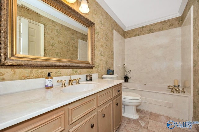 bathroom with vanity, ornamental molding, toilet, and a tub