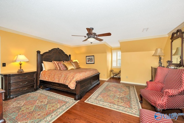 bedroom featuring a textured ceiling, wood-type flooring, crown molding, and ceiling fan