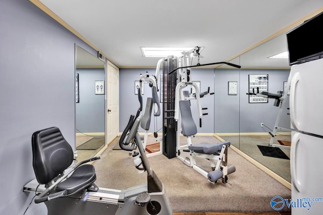 workout area with ornamental molding