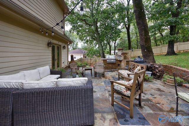 view of patio / terrace featuring an outdoor hangout area and area for grilling