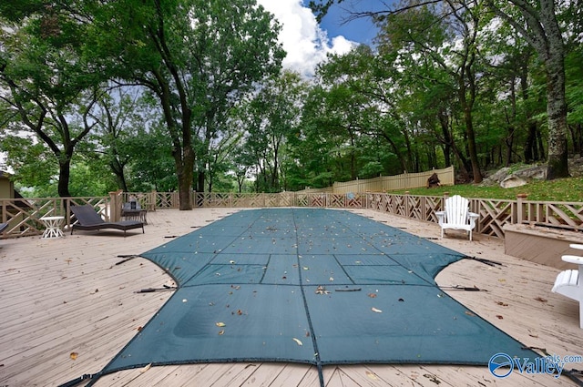 view of pool with a deck