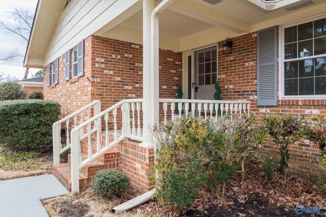 property entrance with a porch