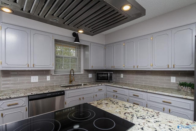 kitchen featuring white cabinetry, sink, and dishwasher