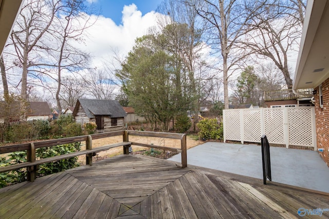 deck featuring a storage shed